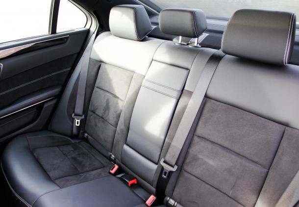 London Mercedes Benz E-class sedan car rear seats interior